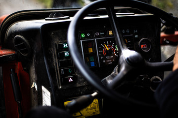 Obraz na płótnie Canvas tractor cockpit wheel technic