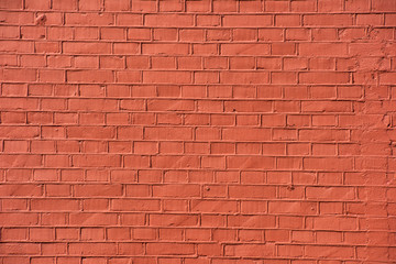 Fototapeta na wymiar Surface of red brick wall