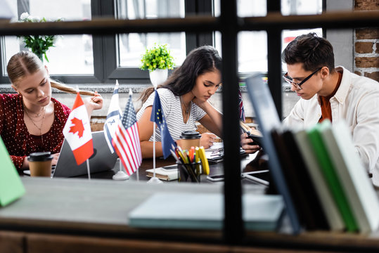 Selective Focus Of Multicultural Students Studying In Apartment