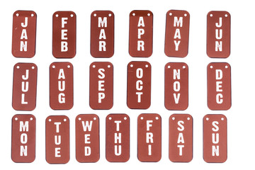 Month tag labels in red metal
