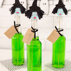 Creative Halloween cocktail for woman with witches heads