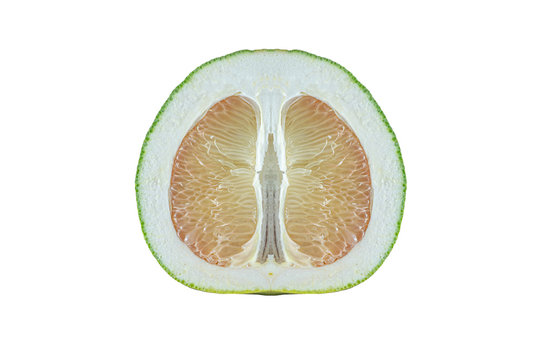 Pomelo cut in half lengthways isolated on white background. Pomelo is a plant in the same family as oranges with thick dimpled skin. Has a sweet and sour taste. Rich in vitamin C. 