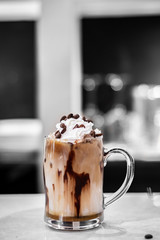 glass of coffee and chocolate on table