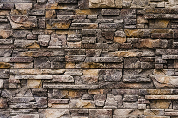 Decorative stone wall with beautiful hewn stone
