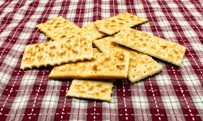 Crackers on a picnic table cloth