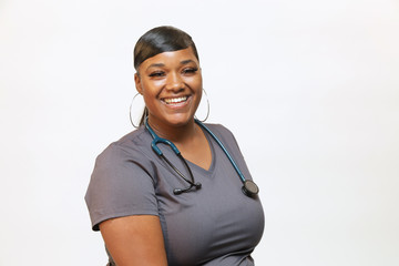 Healthcare professional on white background with copy space, photo of a female nurse