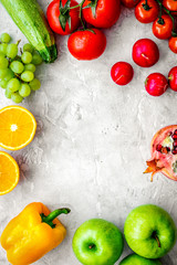 diet food with fresh fruits and vegetables salad stone background top view mockup