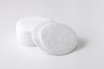 A stack of cotton pads and a number of separate discs deployed on the camera