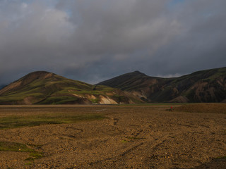 Beautiful panorama of colorful volcanic mountains in Landmannalaugar camp site area of Fjallabak Nature Reserve in Highlands region of Iceland