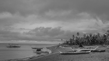 Black and white photography of a beach