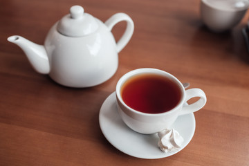 Hot tea in white cup