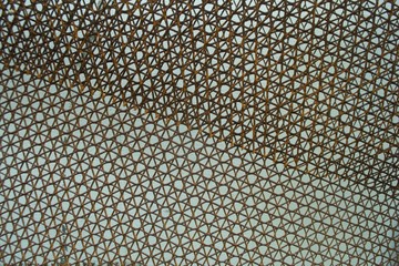 Rust steel grating along the wall