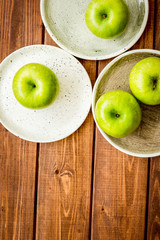 ripe green apples wooden table background top view space for text