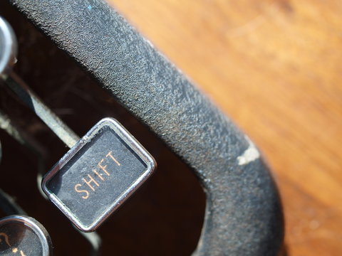 Close-up of Shift key in vintage typewriter