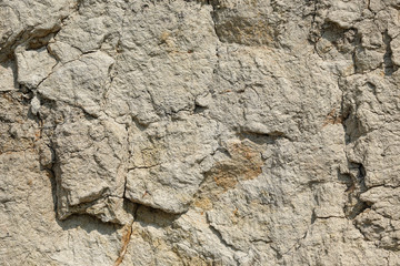 Texture of different layers of clay underground in a clay quarry. clay wall background close up