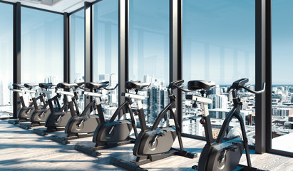 Fototapeta na wymiar Modern gym with exercise bikes near big panoramic windows in skyscraper, 3d rendering.