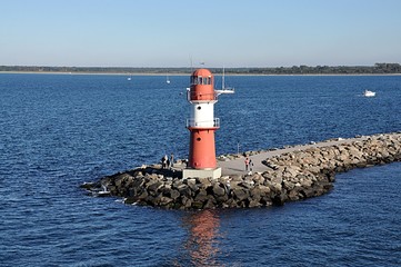 high lighthouse and sea