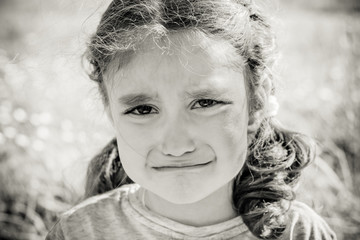 Portrait of a girl close-up. The girl is five years old.