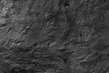 Seamless black rough concrete wall texture background.  dark cement wall.  grey plaster texture....