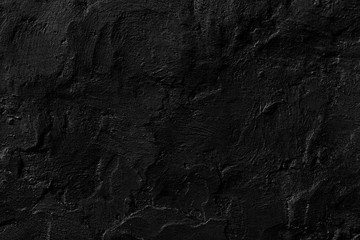 Seamless black rough concrete wall texture background.  dark cement wall.  grey plaster texture. blank for the designer