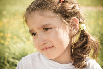 Portrait of a girl close-up. The girl is five years old.
