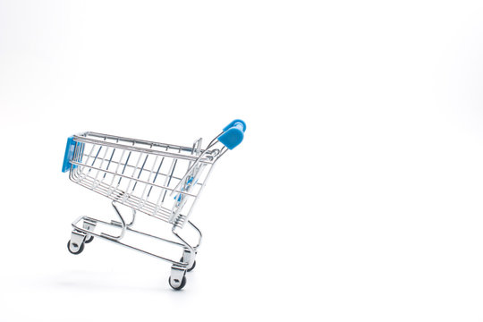 Shopping cart isolated on white background. Market,sale and consumerism concept.