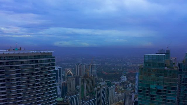 Makati City skyline and modern buildings business district of Metro Manila, Philippines. Aerial 4K