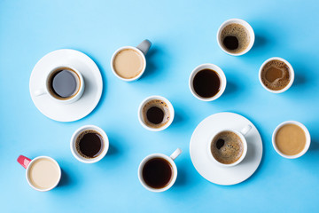 Creative flat lay with assortment of coffee cups