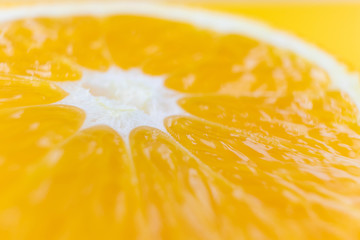 Bright juicy citrus pulp close-up. High-quality image is suitable for topics: healthy lifestyle, vitamins, proper nutrition, diet, summer, fresh juices. Background fruit texture.