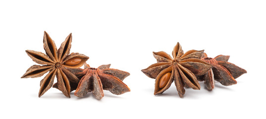Anise stars on a white background