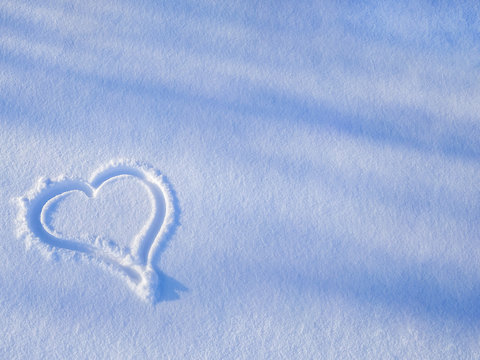 heart drawn on snow, thaw, frost, background