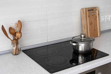 Kitchen with built in ceramic induction stove