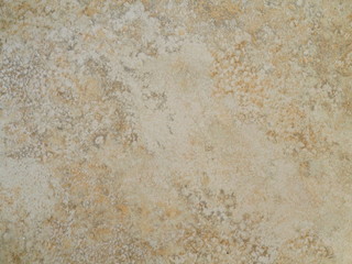 structure (in warm colors, yellow, gray and brown) with scratches and cracks