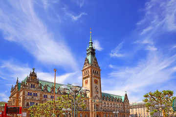 Fototapeta na wymiar Townhall city hall tower in Hamburg, Germany on a sunny summer day
