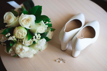 Bride wedding details - wedding shoes as a backgrond