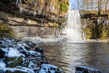 Wales waterfall Sgwd Gwladys in winter