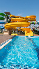 Water park with colorful slides and pools