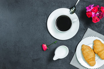 Morning breakfast coffee and croissant