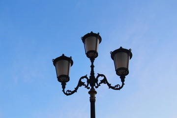 Fototapeta na wymiar beautiful streetlight on blue sky. Urban architecture and design