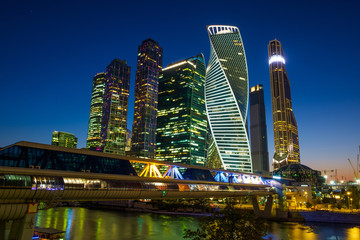 Fototapeta na wymiar Magnificent landscape with a view of skyscrapers and the river in Moscow, twilight