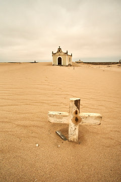 Old cemetery at the abandoned village of Ilha dos Tigres, Angola