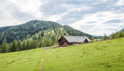 Wooden cabin on the tops of the Austrian mountains.