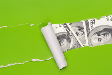 US money through ragged paper