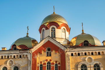 Fototapeta na wymiar The central part of the monastery in New Athos of Abkhazia on the Black Sea coast in the mountains