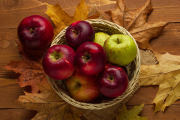 Basket with red and green autumn apples, top view