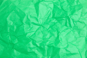green crumpled sheet of colored paper texture