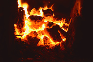 burning charcoal stove close-up
