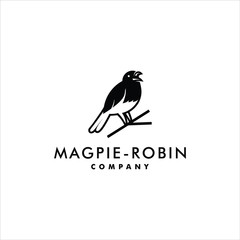 Obraz premium magpie robin bird silhouette standing in branch for bird lover logo design inspiration