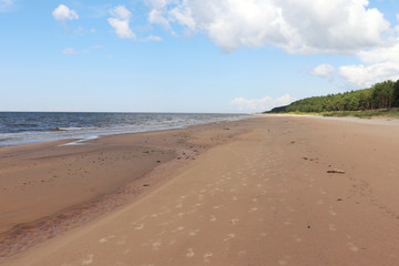 Fototapeta na wymiar Footprints on a beach at the Baltic Sea in Latvia
