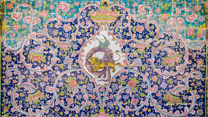 Colorful painting mosaic tiles on the wall at Golestan palace, Tehran, Iran